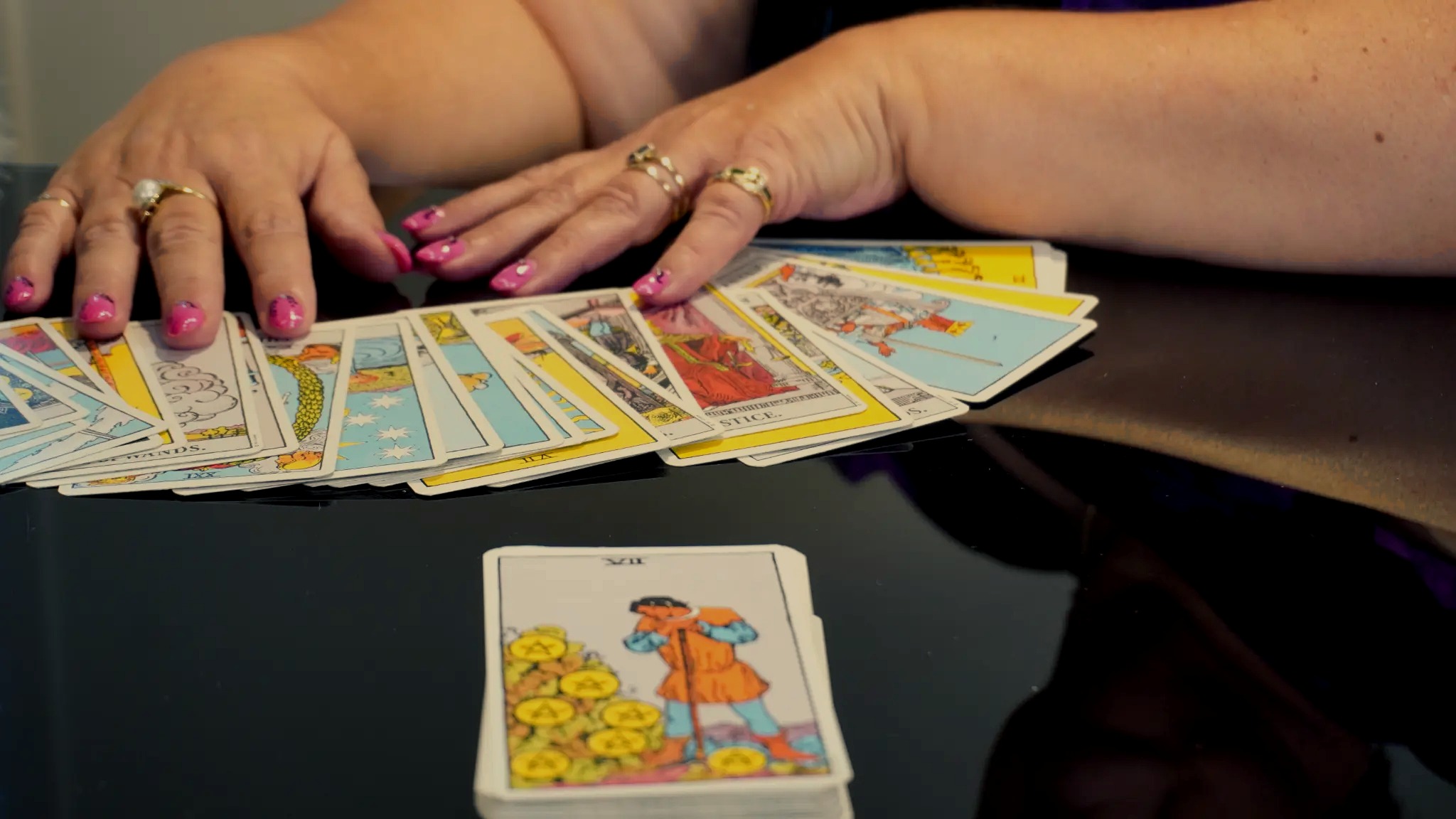 Anne spreading tarot cards